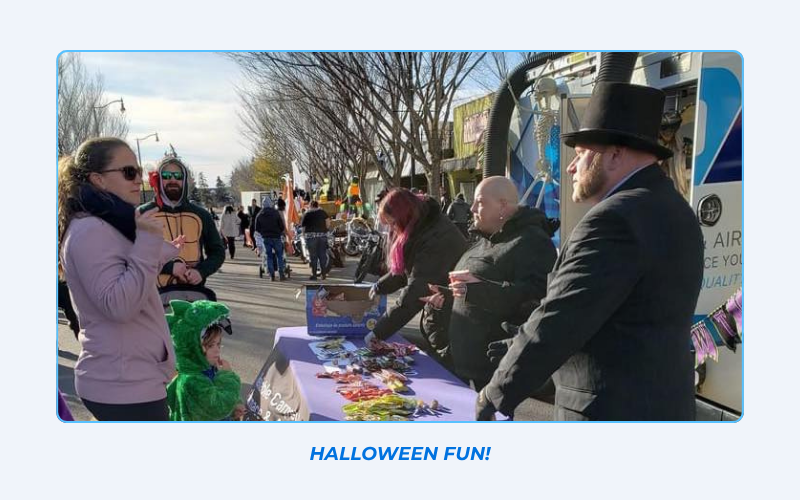 Edmonton families visiting the OAB Reliable Carpet Care furnace truck at a Halloween celebration